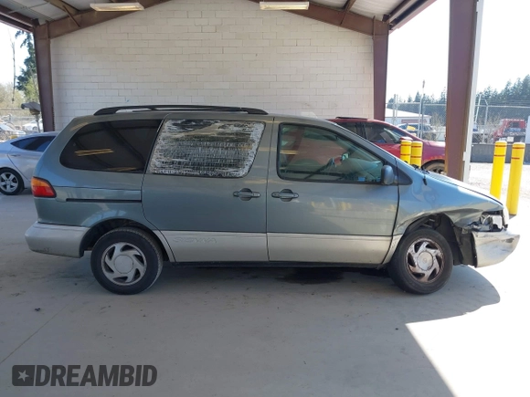 1999 Toyota Sienna LE with VIN 4T3ZF13C4XU166786, listed as a IAAI auction lot 42057995 with 316,259 mi miles. Bid and sale history available at carsss.com. Image 13.