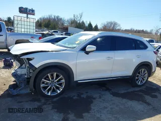 2018 Mazda CX-9 Grand Touring with VIN JM3TCADY6J0229768, listed as a IAAI auction lot 41724072 with 80,918 mi miles and . Bid and sale history available at DreamBid. Image 15.