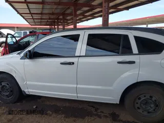 2008 Dodge Caliber SE with VIN 1B3HB28B38D656519, listed as a IAAI auction lot 42152064 with 209,292 mi miles. Bid and sale history available at carsss.com. Image 14.