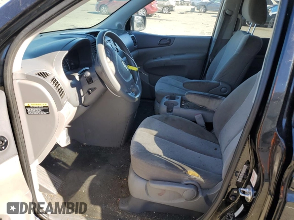 2012 Kia Sedona LX with VIN KNDMG4C79C6476519, listed as a Copart auction lot 67758564 with 173,308 mi miles and Salvage Title. Bid and sale history available at carsss.com. Image 7.