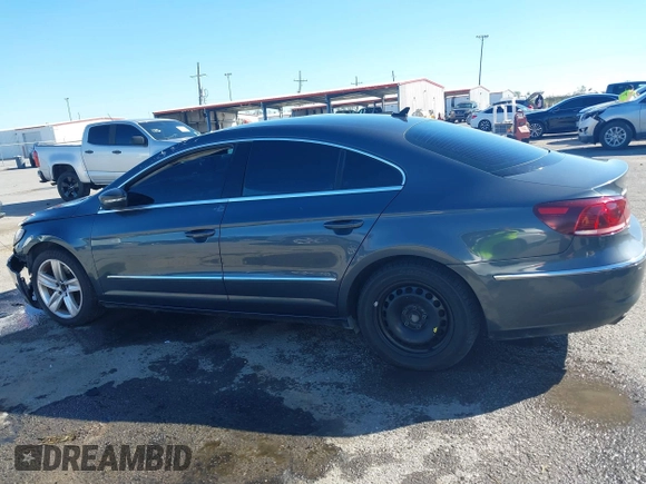 2014 Volkswagen CC R-Line with VIN WVWBN7AN1EE518173, listed as a IAAI auction lot 40895187 with 133,960 mi miles. Bid and sale history available at carsss.com. Image 14.