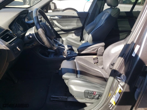 2018 BMW X1 xDrive28i with VIN WBXHT3C31J5K27206, listed as a Copart auction lot 45941755 with 99,777 mi miles and Salvage Title. Bid and sale history available at carsss.com. Image 7.