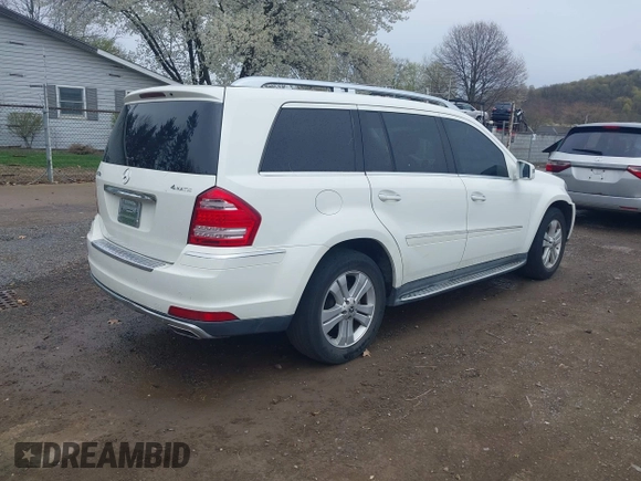 2011 Mercedes-Benz GL-Class GL 450 with VIN 4JGBF7BE0BA730685, listed as a IAAI auction lot 42029019 with 142,190 mi miles. Bid and sale history available at carsss.com. Image 4.