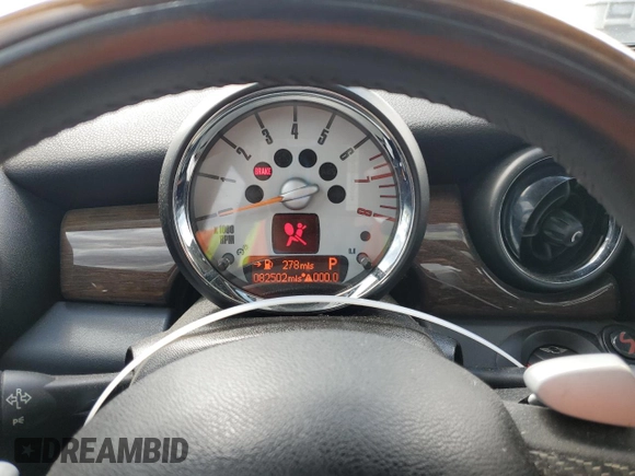 2008 MINI Hardtop with VIN WMWMF33528TT64260, listed as a Copart auction lot 52642935 with 82,502 mi miles and Salvage Title. Bid and sale history available at DreamBid. Image 9.