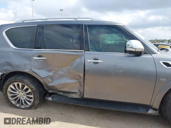 2015 Infiniti QX80 with VIN JN8AZ2NF5F9573634, listed as a IAAI auction lot 41510452 with 127,530 mi miles and . Bid and sale history available at DreamBid. Image 14.