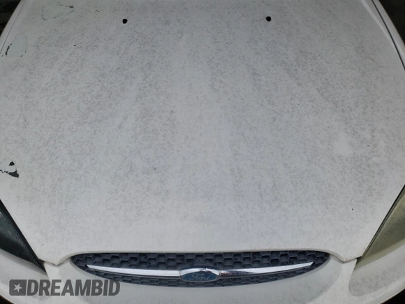 2003 Ford Taurus LX Standard with VIN 1FAFP52U53G280700, listed as a Copart auction lot 87488014 with 128,020 mi miles and Salvage title. Bid and sale history available at DreamBid. Image 11.