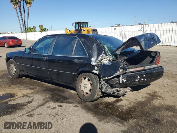 1994 Mercedes-Benz S with VIN WDBGA51E2RA184222, listed as a Copart auction lot 77403664 with 109,428 mi miles and Salvage Title. Bid and sale history available at DreamBid. Image 2.