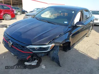 2019 Volkswagen Jetta GLI S z VIN 3VW5T7BU3KM245927, wystawiony jako IAAI lot #41573257 z przebiegiem 57 322 mil mil oraz . Historia ofert i sprzedaży dostępna na DreamBid. Obrazek 18.