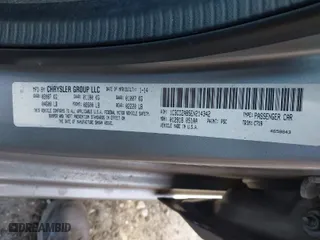 2014 Dodge Avenger SE with VIN 1C3CDZAB5EN214342, listed as a IAAI auction lot 41672955 with 168,701 mi miles. Bid and sale history available at carsss.com. Image 9.