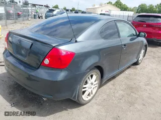 2006 Scion tC with VIN JTKDE177260081483, listed as a IAAI auction lot 42076072 with 156,556 mi miles. Bid and sale history available at carsss.com. Image 4.