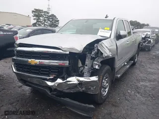 2018 Chevrolet Silverado 1500 LT with VIN 1GCVKREH6JZ360826, listed as a IAAI auction lot 41423923 with 158,170 mi miles. Bid and sale history available at carsss.com. Image 2.