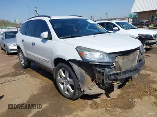 2016 Chevrolet Traverse LTZ z VIN 1GNKRJKDXGJ265413, wystawiony jako IAAI lot #42001292 z przebiegiem 157 129 mil mil oraz . Historia ofert i sprzedaży dostępna na DreamBid. Obrazek 1.