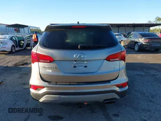 2018 Hyundai Santa Fe 2.4L z VIN 5NMZTDLB8JH098926, wystawiony jako IAAI lot #41816513 z przebiegiem 92 920 mil mil oraz . Historia ofert i sprzedaży dostępna na DreamBid. Obrazek 17.