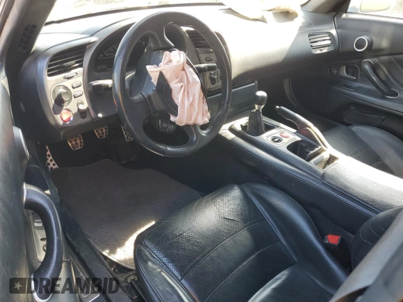2002 Honda S2000 with VIN JHMAP11412T003822, listed as a Copart auction lot 48801985 with 122,850 mi miles and Salvage Title. Bid and sale history available at DreamBid. Image 8.