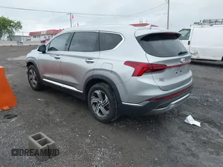 2022 Hyundai Santa Fe SEL z VIN 5NMS34AJ2NH476238, wystawiony jako IAAI lot #42119497 z przebiegiem 23 883 mil mil oraz . Historia ofert i sprzedaży dostępna na DreamBid. Obrazek 3.