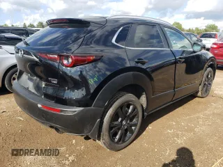 2022 Mazda CX-30 2.5 Turbo with VIN 3MVDMBAY0NM447128, listed as a Copart auction lot 54007924 with 10,596 mi miles and Salvage Title. Bid and sale history available at DreamBid. Image 3.