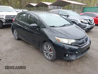 2015 Honda Fit EX-L with VIN 3HGGK5H88FM726406, listed as a IAAI auction lot 42033501 with 124,216 mi miles. Bid and sale history available at carsss.com. Image 1.