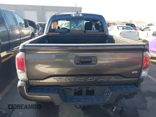 2023 Toyota Tacoma SR with VIN 3TMCZ5AN2PM553928, listed as a IAAI auction lot 40999044 with 9,210 mi miles and . Bid and sale history available at DreamBid. Image 16.