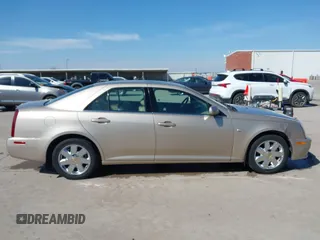 2005 Cadillac STS z VIN 1G6DC67A950171835, wystawiony jako IAAI lot #41599105 z przebiegiem 74 235 mil mil oraz . Historia ofert i sprzedaży dostępna na DreamBid. Obrazek 13.