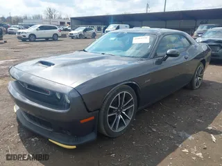 2023 Dodge Challenger R/T with VIN 2C3CDZBTXPH610110, listed as a IAAI auction lot 41994739 with 40,093 mi miles. Bid and sale history available at carsss.com. Image 2.