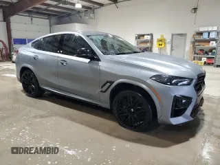 2024 BMW X6 M with VIN 5YM23ET0XR9U26576, listed as a Copart auction lot 86698164 with 6,669 mi miles and Salvage Title. Bid and sale history available at carsss.com. Image 4.