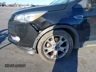 2016 Ford Escape Titanium with VIN 1FMCU0JX3GUA90420, listed as a IAAI auction lot 41850537 with 115,770 mi miles. Bid and sale history available at carsss.com. Image 18.