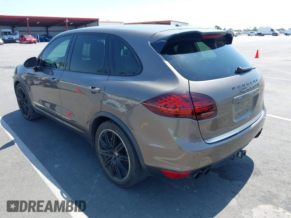 2012 Porsche Cayenne Turbo with VIN WP1AC2A21CLA82667, listed as a IAAI auction lot 42383728 with 133,134 mi miles and . Bid and sale history available at DreamBid. Image 3.