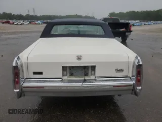 1992 Cadillac Brougham with VIN 1G6DW54E5NR708009, listed as a Copart auction lot 56849345 with 83,203 mi miles and Salvage title. Bid and sale history available at DreamBid. Image 6.