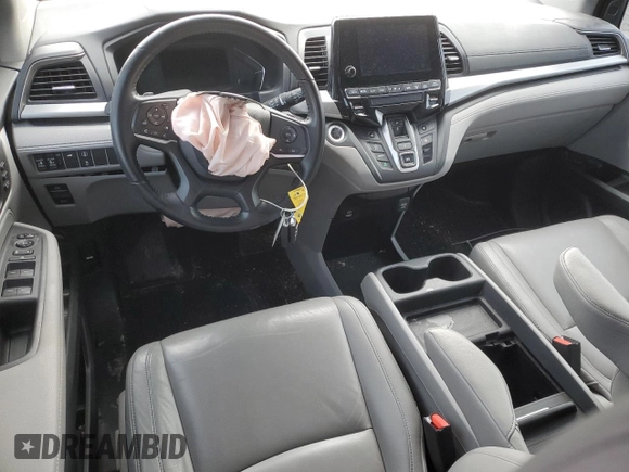 2021 Honda Odyssey EX-L with VIN 5FNRL6H77MB039727, listed as a Copart auction lot 88869145 with Not Provided miles and Salvage Title. Bid and sale history available at DreamBid. Image 8.