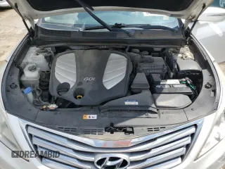 2012 Hyundai Azera z VIN KMHFG4JG6CA153582, wystawiony jako Copart lot #64809485 z przebiegiem 79 425 mil mil oraz Czysty tytuł • Clean title. Historia ofert i sprzedaży dostępna na DreamBid. Obrazek 11.