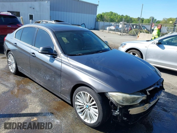 2013 BMW 3 Series ActiveHybrid 3 with VIN WBA3F9C5XDF484346, listed as a IAAI auction lot 41998341 with 145,271 mi miles. Bid and sale history available at carsss.com. Image 1.