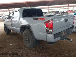2019 Toyota Tacoma 4WD SR with VIN 3TMCZ5ANXKM225066, listed as a IAAI auction lot 41825265 with 75,908 mi miles. Bid and sale history available at carsss.com. Image 3.