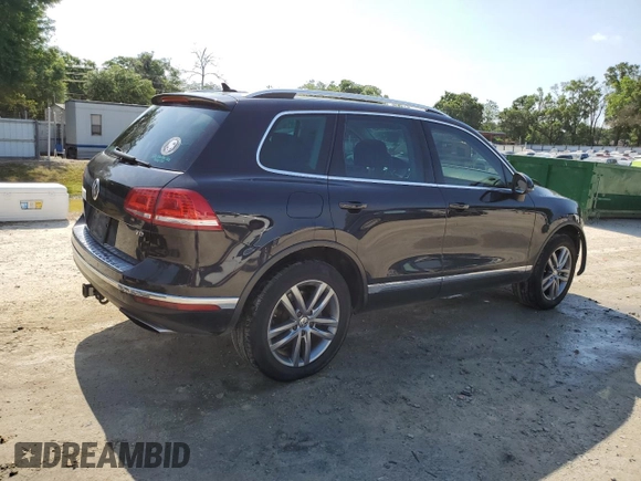2015 Volkswagen Touareg Lux с VIN WVGEP9BP4FD004212, выставлен на аукционе Copart как лот 54021345 с пробегом 156 164 миль миль и Списание • Salvage title. История ставок и продаж доступна на DreamBid. Изображение 3.