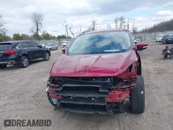 2016 Ford Escape Titanium with VIN 1FMCU9JX2GUA89716, listed as a IAAI auction lot 41899786 with 85,474 mi miles and . Bid and sale history available at DreamBid. Image 12.