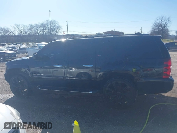 2011 Chevrolet Suburban LT with VIN 1GNSCJE06BR293634, listed as a IAAI auction lot 41742616 with 204,222 mi miles. Bid and sale history available at carsss.com. Image 14.