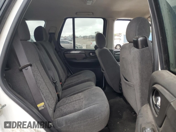 2006 GMC Envoy SLE z VIN 1GKDT13S562124794, wystawiony jako Copart lot #51649085 z przebiegiem 152 844 mil mil oraz Szkoda całkowita • Salvage title. Historia ofert i sprzedaży dostępna na DreamBid. Obrazek 12.