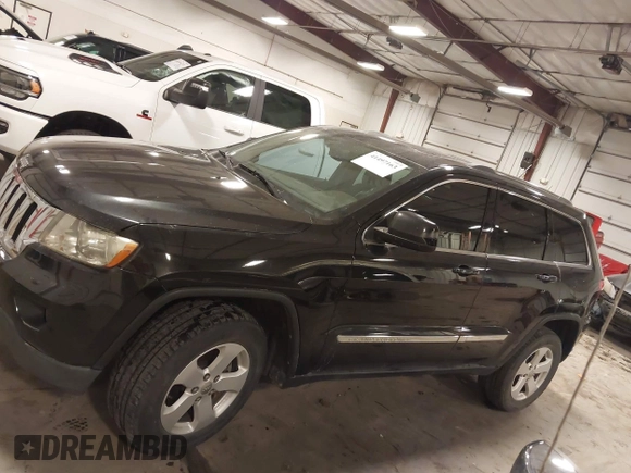 2012 Jeep Grand Cherokee Laredo with VIN 1C4RJFAG6CC266144, listed as a IAAI auction lot 41497163 with 233,755 mi miles. Bid and sale history available at carsss.com. Image 15.