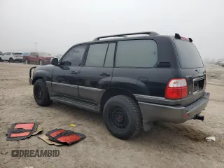 2001 Lexus LX 470 z VIN JTJHT00W513509447, wystawiony jako Copart lot #43988595 z przebiegiem 251 861 mil mil oraz Tytuł czysty. Historia ofert i sprzedaży dostępna na DreamBid. Obrazek 2.