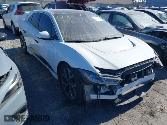 2020 Jaguar I-Pace SE with VIN SADHC2S14L1F85800, listed as a IAAI auction lot 42444115 with 51,249 mi miles and . Bid and sale history available at DreamBid. Image 1.