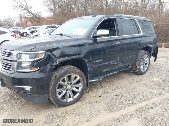 2016 Chevrolet Tahoe LTZ with VIN 1GNSKCKC2GR104305, listed as a IAAI auction lot 41697868 with 124,670 mi miles. Bid and sale history available at carsss.com. Image 6.