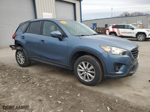 2016 Mazda CX-5 Touring with VIN JM3KE4CY9G0608152, listed as a Copart auction lot 51568775 with 142,676 mi miles and Salvage Title. Bid and sale history available at carsss.com. Image 4.