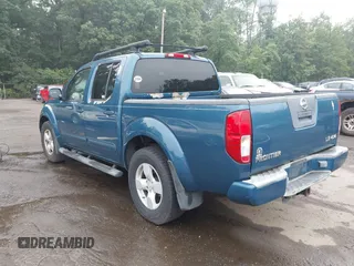 2005 Nissan Frontier LE with VIN 1N6AD07W55C438180, listed as a IAAI auction lot 42611550 with 166,700 mi miles and . Bid and sale history available at DreamBid. Image 3.