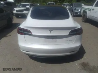 2021 Tesla Model 3 Long Range with VIN 5YJ3E1EB5MF992741, listed as a IAAI auction lot 39511260 with 39,090 mi miles. Bid and sale history available at carsss.com. Image 15.