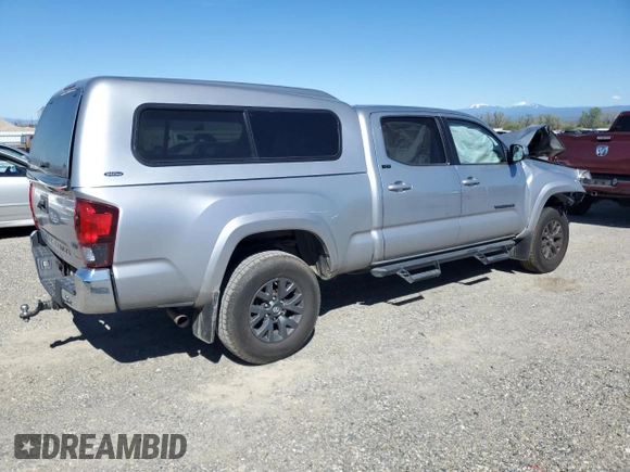 2021 Toyota Tacoma SR5 with VIN 3TMDZ5BN0MM103256, listed as a Copart auction lot 50101675 with 49,673 mi miles and Salvage title. Bid and sale history available at DreamBid. Image 3.