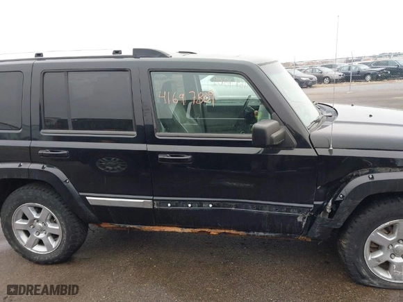 2006 Jeep Commander Limited with VIN 1J8HG582X6C124231, listed as a IAAI auction lot 41697809 with NaN miles. Bid and sale history available at carsss.com. Image 14.