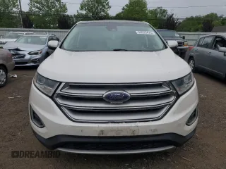 2015 Ford Edge Titanium z VIN 2FMPK4K88FBC05216, wystawiony jako Copart lot #56523475 z przebiegiem 156 558 mil mil oraz Szkoda całkowita • Salvage title. Historia ofert i sprzedaży dostępna na DreamBid. Obrazek 5.