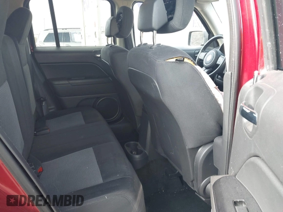 2014 Jeep Patriot Latitude with VIN 1C4NJRFB0ED628074, listed as a IAAI auction lot 41946451 with 92,118 mi miles and . Bid and sale history available at carsss.com. Image 8.