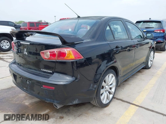 2009 Mitsubishi Lancer with VIN JA3AU86W29U039924, listed as a IAAI auction lot 41923692 with 183,591 mi miles and . Bid and sale history available at DreamBid. Image 4.