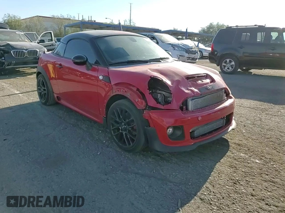 2015 MINI Coupe S z VIN WMWSX3C59FT409468, wystawiony jako Copart lot #71401384 z przebiegiem Nie podano mil oraz Szkoda całkowita • Salvage title. Historia ofert i sprzedaży dostępna na DreamBid. Obrazek 10.
