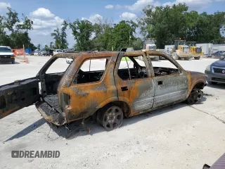 2001 Isuzu Rodeo S z VIN 4S2CK58W114309312, wystawiony jako Copart lot #56409955 z przebiegiem Nie podano mil oraz Nie do naprawy • Non repairable. Historia ofert i sprzedaży dostępna na DreamBid. Obrazek 3.
